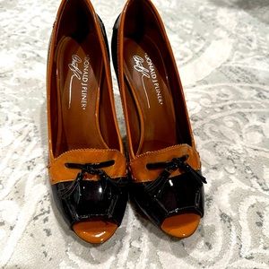 Black/ Tan Donald Pliner Peep Toe shoes.